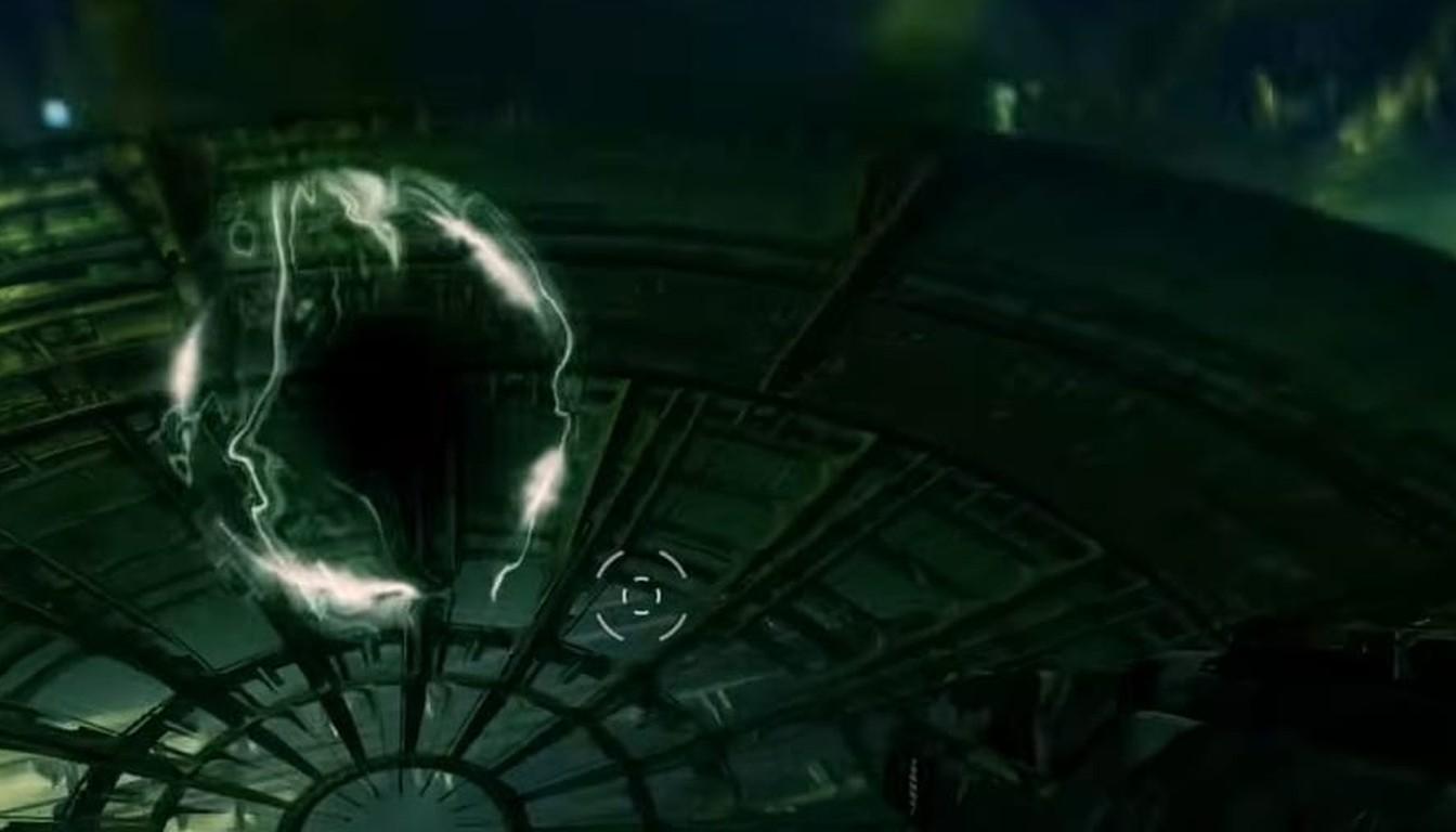 Round grated arena platform with a dark orb in a green-lit chamber