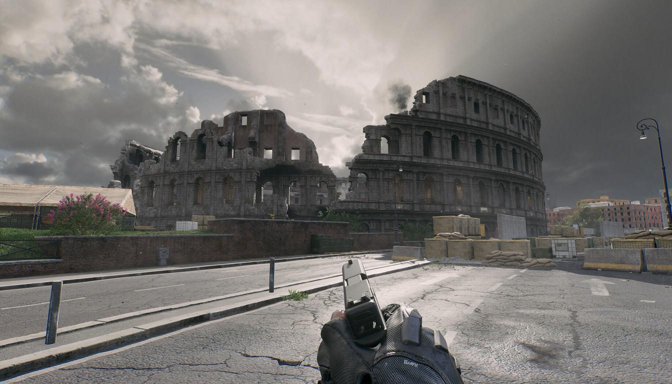 The Colosseum on the horizon beyond an empty road