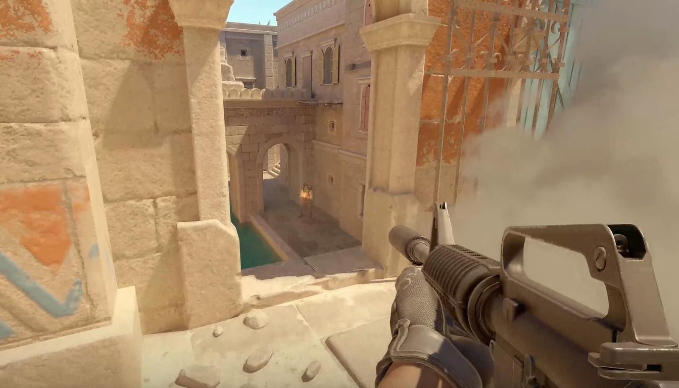 Player with a rifle in sandy arched passages in CS2