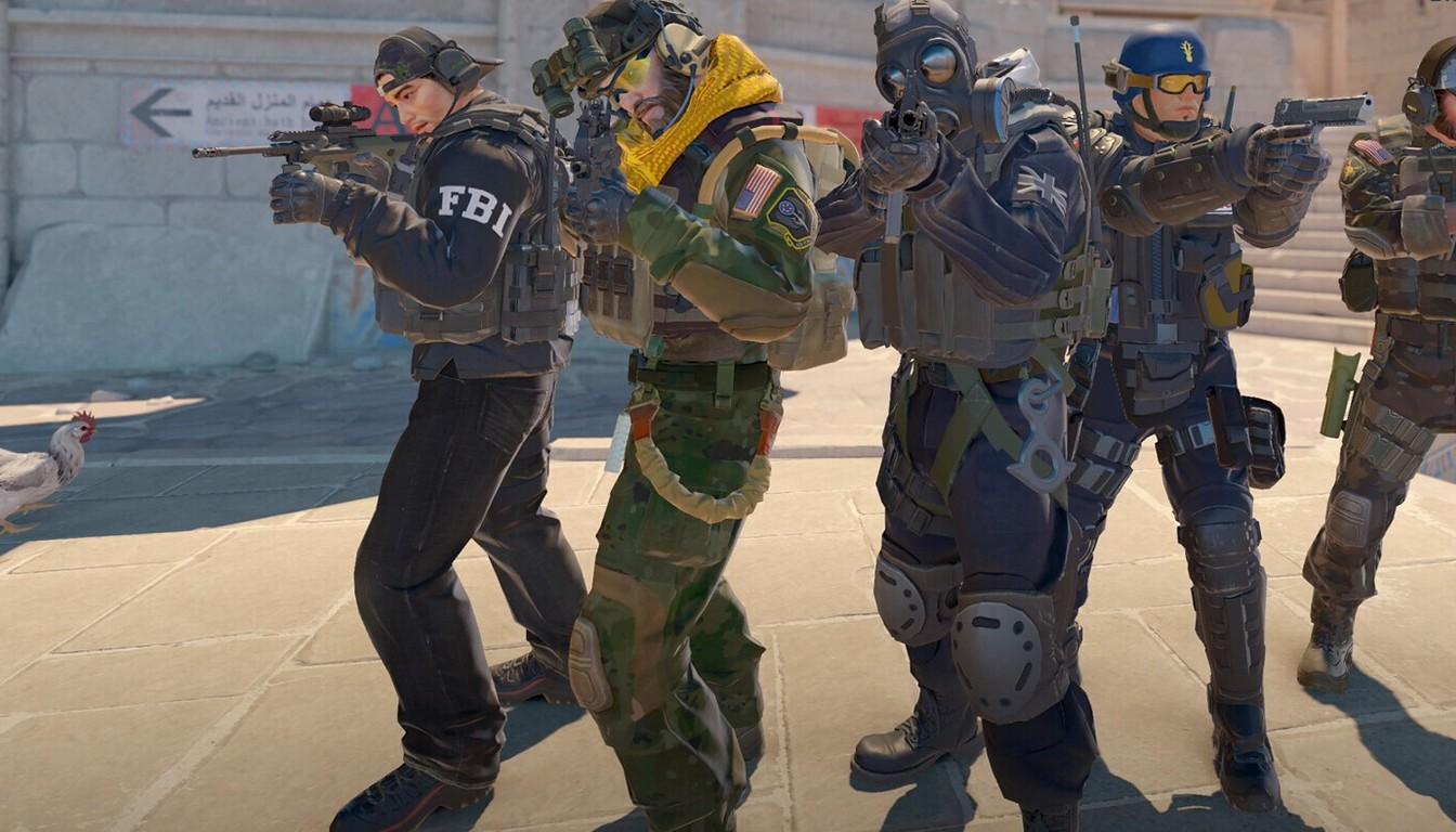 A CS2 counter-terrorist squad moving in a stack down a street
