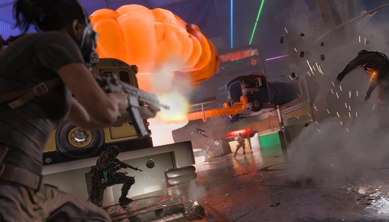 An operator firing at enemies in Turbo Tilt in front of an orange blast