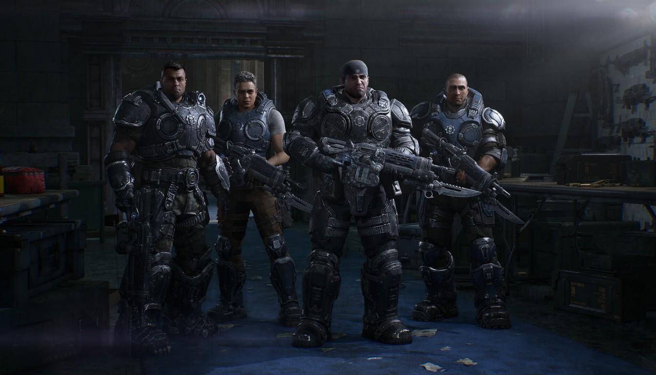 Four squad members standing shoulder to shoulder in a dark room