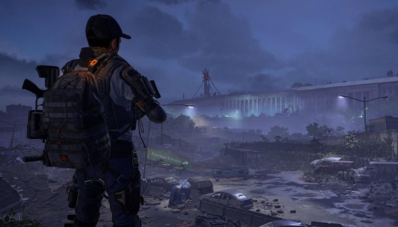 An agent seen from behind looking at a ruined city and a bridge at dusk