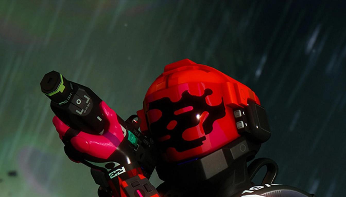 A fighter in a red helmet raising a weapon in heavy rain