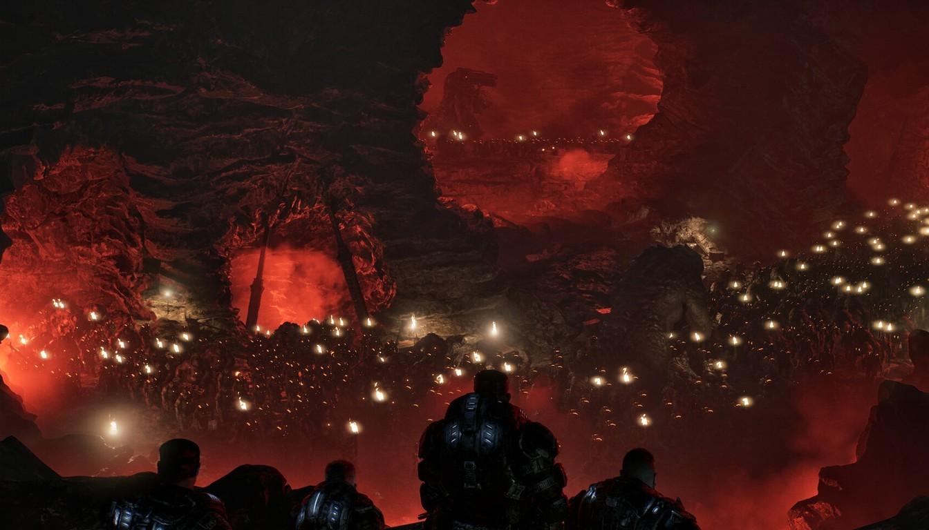 A squad of soldiers facing a huge horde of enemies in a red cavern