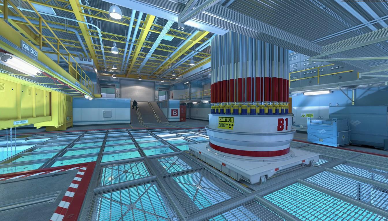 A bright open CS2 location with a red-and-white column and metal catwalks