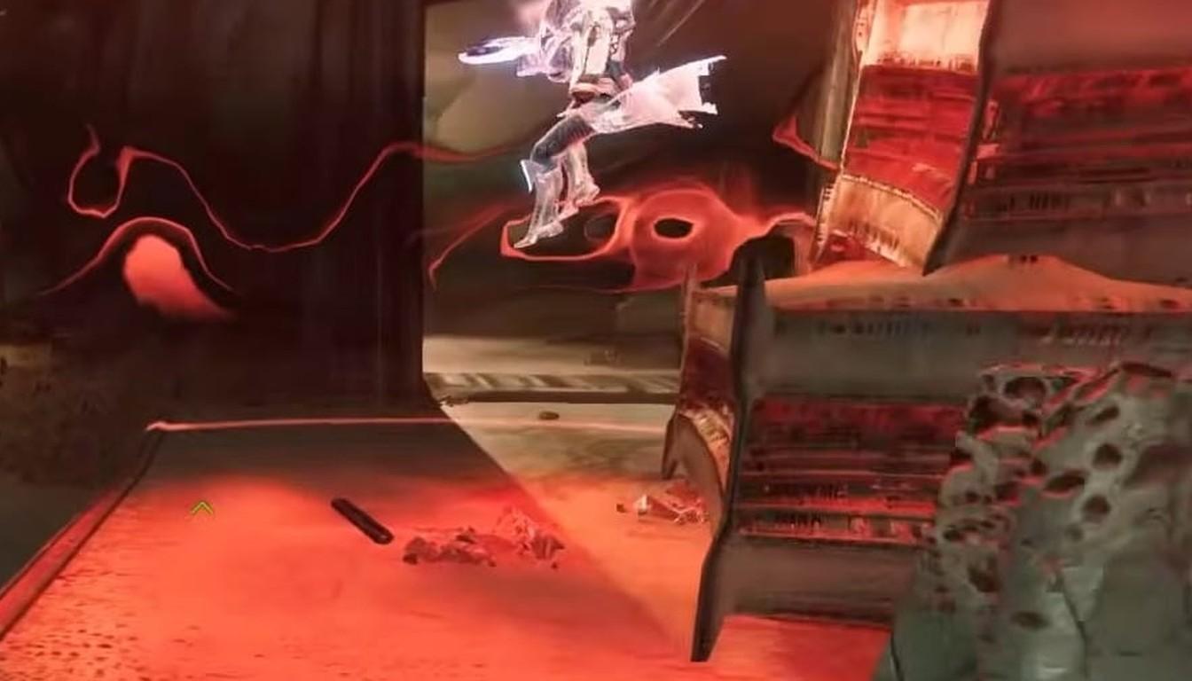 Red-lit room with stepped ledges and a figure hovering above